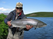 Steini holding my second 100 cm salmon from 2011. Steini holding my second 100 cm salmon from 2011.